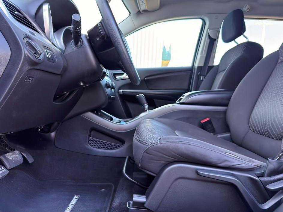 2013 BLUE /Black/Light Frost Dodge Journey (3C4PDCBB4DT) with an 24L I-4 DOHC engine, Automatic transmission, located at 1175 N Woodruff Ave, Idaho Falls, ID, 83401, 43.506901, -111.999657 - This 2013 Dodge Journey is a versatile midsize crossover built to handle the demands of daily driving, family errands, and weekend travel. Powered by a 2.4L I4 engine, it offers practical efficiency and dependable performance for commuting and highway trips. The interior provides comfortable seating - Photo#13