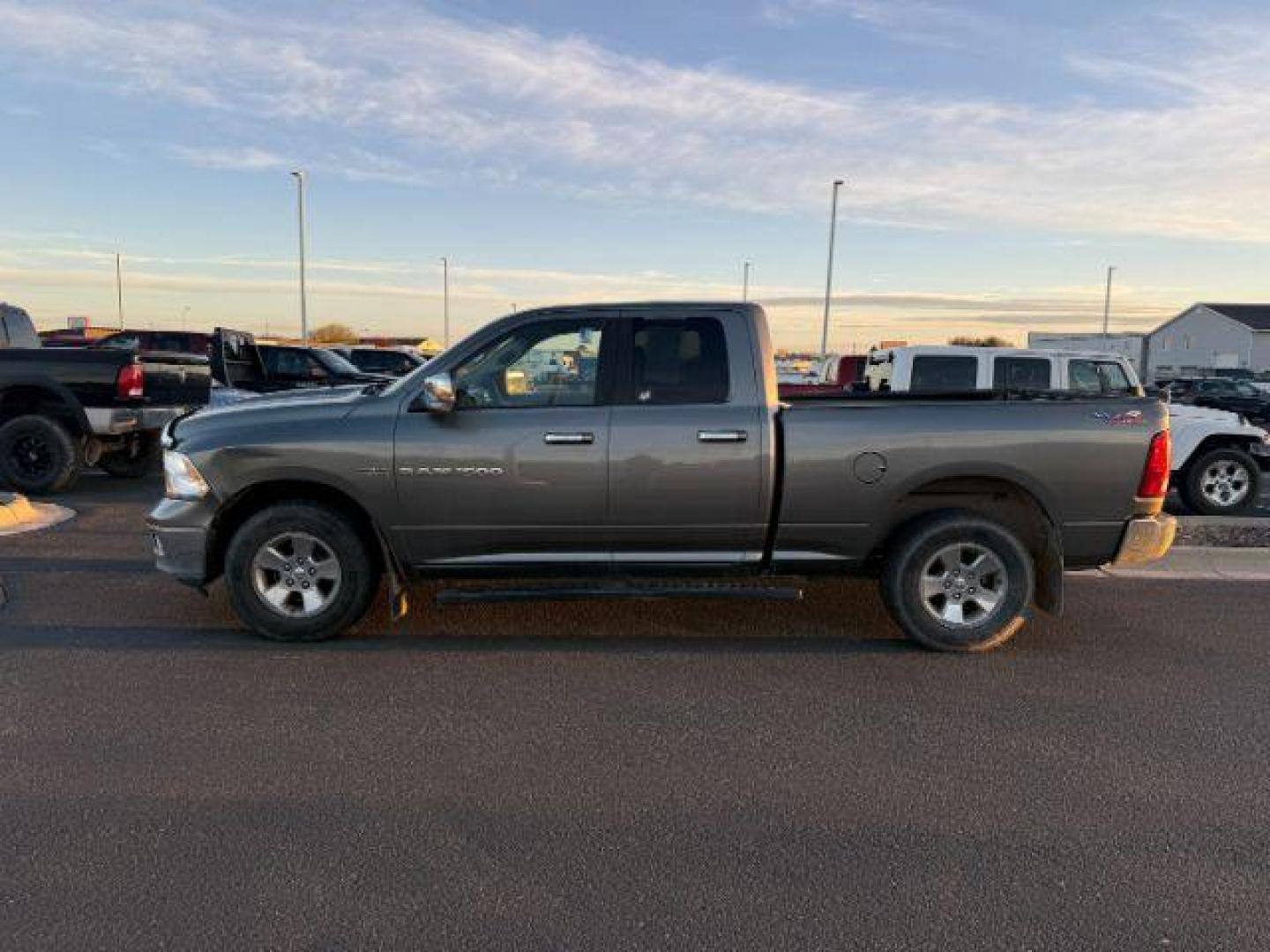 2011 Mineral Grey Metallic Clearcoat /Dark Slate/Medium Greystone Ram Ram 1500 (1D7RV1GT4BS) with an HEMI 57L V-8 variable valve control engine, located at 1175 N Woodruff Ave, Idaho Falls, ID, 83401, 43.506901, -111.999657 - At Timberline Auto, finding a great deal on your next vehicle is always easy! Our experienced sales staff's goal is to help find you the right vehicle at the right price! Our knowledgeable finance department has options for almost any credit score. We offer extended service contract options to prote - Photo#1