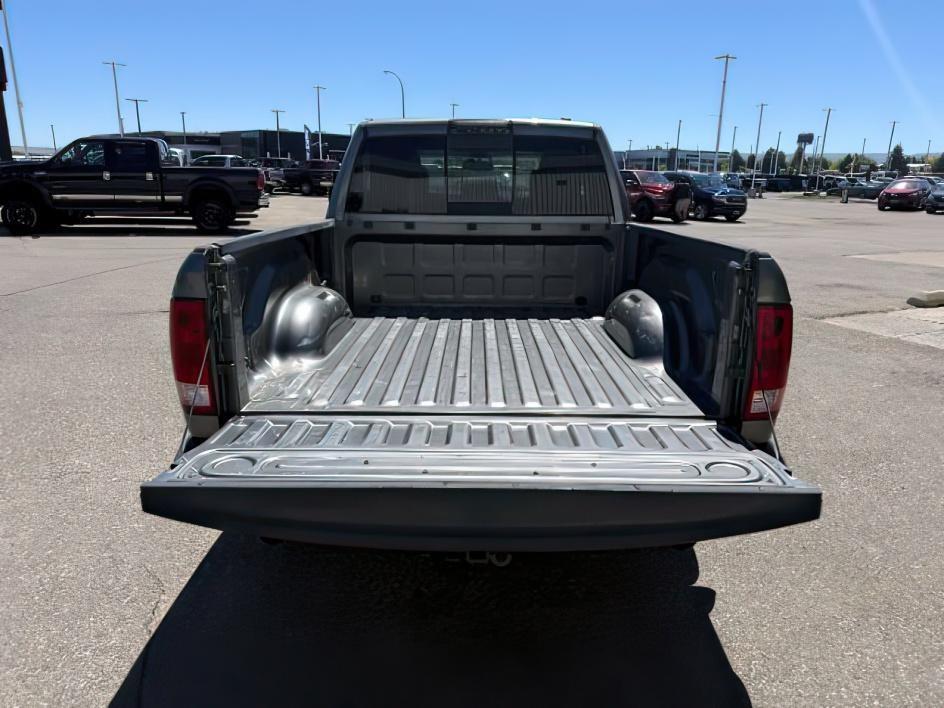 2011 Mineral Grey Metallic Clearcoat /Dark Slate/Medium Greystone Ram Ram 1500 SLT (1D7RV1GT4BS) with an HEMI 5.7L V-8 variable valve control engine, located at 1235 N Woodruff Ave., Idaho Falls, 83401, (208) 523-1053, 43.507172, -112.000488 - This 2011 Ram 1500 is a 4x4 full-size pickup built for dependable V8 strength and everyday utility. Powered by a 5.7L HEMI V8 (VIN verified), it delivers strong towing capability and solid acceleration for hauling trailers, equipment, and weekend loads. The 4x4 system adds traction and control for r - Photo#5