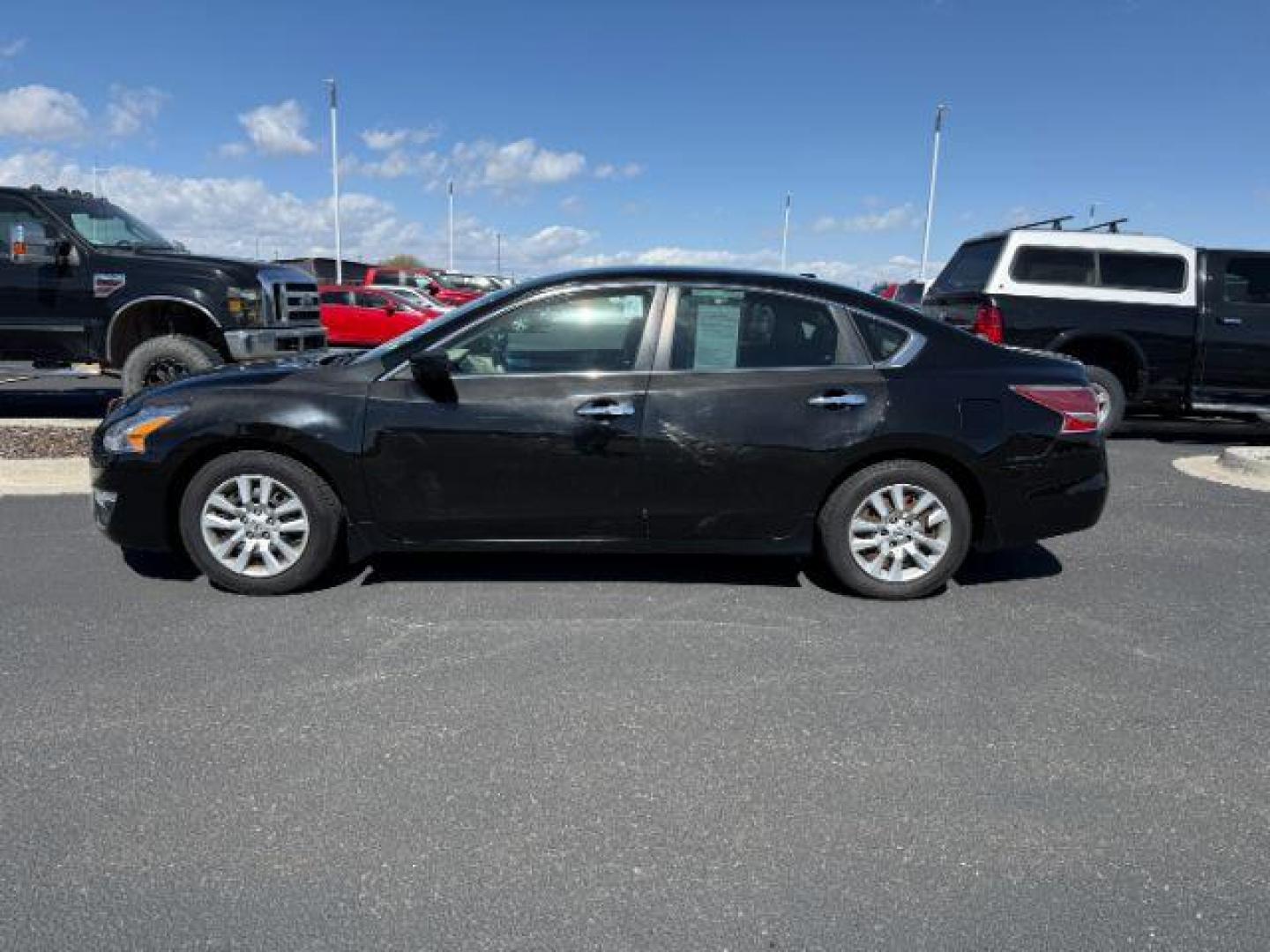 2015 BLACK /Beige Nissan Altima (1N4AL3AP9FC) with an 25L I-4 DOHC engine, Automatic transmission, located at 1175 N Woodruff Ave, Idaho Falls, ID, 83401, 43.506901, -111.999657 - At Timberline Auto, finding a great deal on your next vehicle is always easy! Our experienced sales staff's goal is to help find you the right vehicle at the right price! Our knowledgeable finance department has options for almost any credit score. We offer extended service contract options to prote - Photo#1