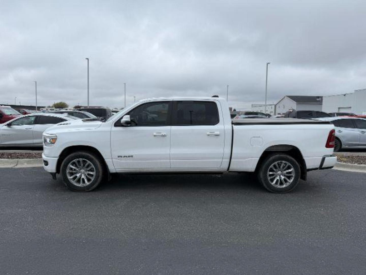 2023 WHITE /Black Ram 1500 (1C6SRFRT0PN) with an HEMI 57L V-8 variable valve control engine, Automatic transmission, located at 1175 N Woodruff Ave, Idaho Falls, ID, 83401, 43.506901, -111.999657 - At Timberline Auto, finding a great deal on your next vehicle is always easy! Our experienced sales staff's goal is to help find you the right vehicle at the right price! Our knowledgeable finance department has options for almost any credit score. We offer extended service contract options to prote - Photo#1