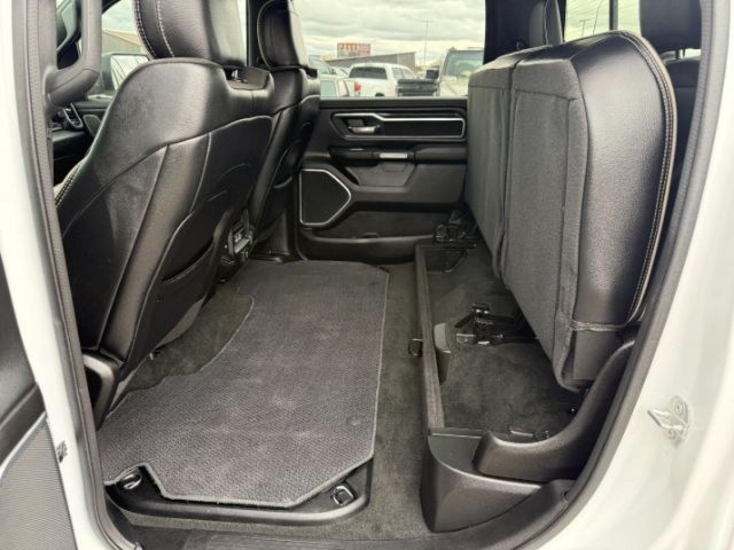 2023 WHITE /Black Ram 1500 (1C6SRFRT0PN) with an HEMI 57L V-8 variable valve control engine, Automatic transmission, located at 1175 N Woodruff Ave, Idaho Falls, ID, 83401, 43.506901, -111.999657 - At Timberline Auto, finding a great deal on your next vehicle is always easy! Our experienced sales staff's goal is to help find you the right vehicle at the right price! Our knowledgeable finance department has options for almost any credit score. We offer extended service contract options to prote - Photo#63