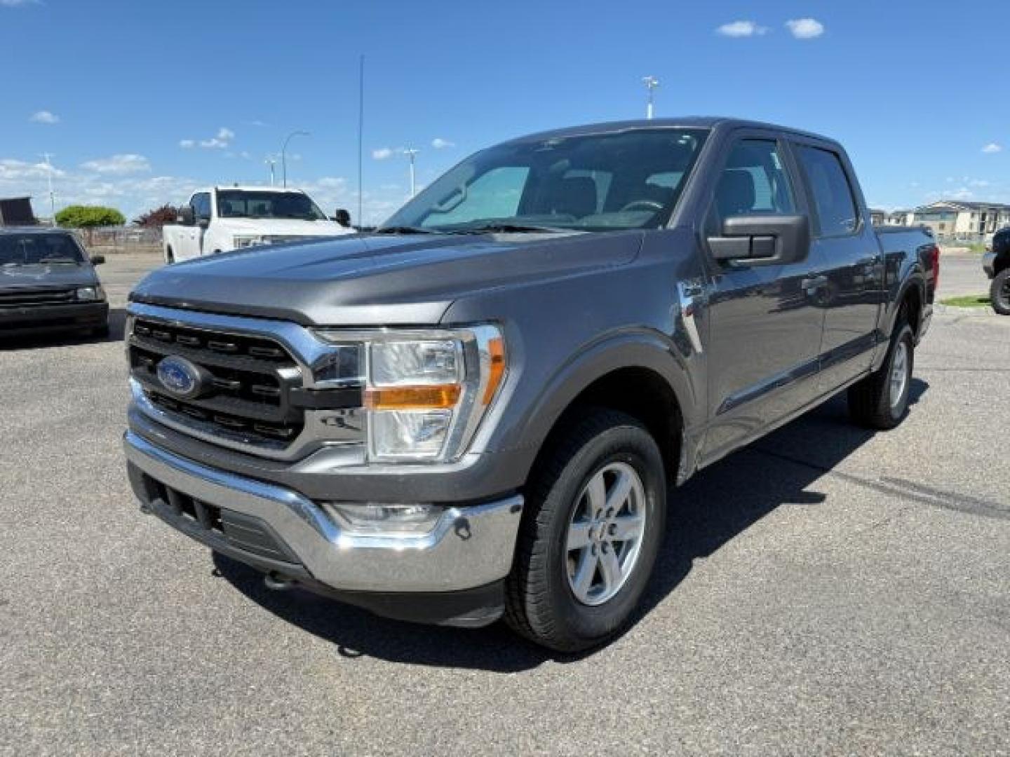 2021 GRAY /Black Ford F-150 XLT (1FTFW1E59MF) with an 5L V-8 port/direct injection engine, AUTOMATIC transmission - At Timberline Auto, finding a great deal on your next vehicle is always easy! Our experienced sales staff's goal is to help find you the right vehicle at the right price! Our knowledgeable finance department has options for almost any credit score. We offer extended service contract options to prote - Photo#28