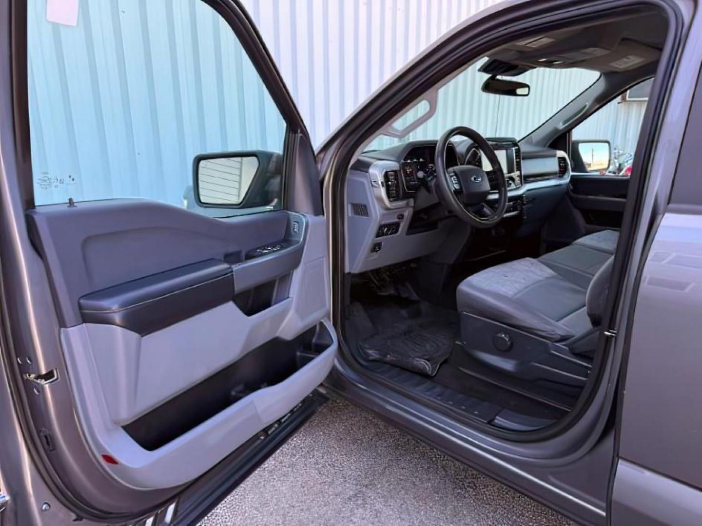 2021 GRAY /Black Ford F-150 XLT (1FTFW1E59MF) with an 5L V-8 port/direct injection engine, AUTOMATIC transmission - At Timberline Auto, finding a great deal on your next vehicle is always easy! Our experienced sales staff's goal is to help find you the right vehicle at the right price! Our knowledgeable finance department has options for almost any credit score. We offer extended service contract options to prote - Photo#12