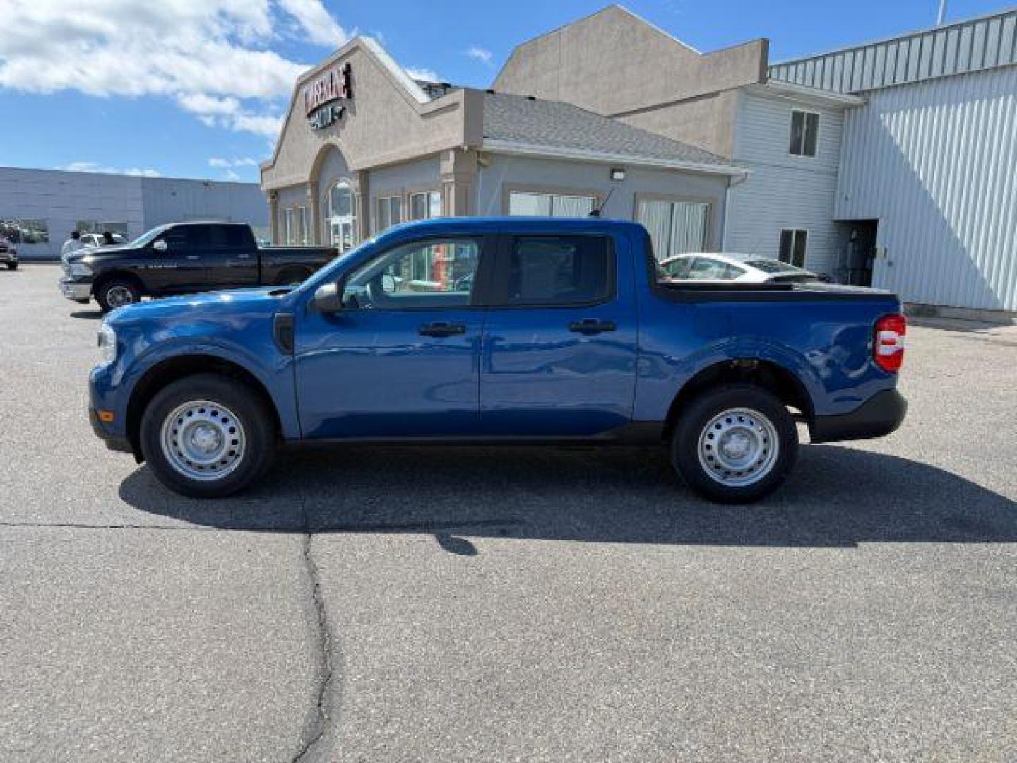 2023 Atlas Blue Metallic /Black Onyx/Medium Dark Slate Ford Maverick XL (3FTTW8E37PR) with an 2.5L I-4 DOHC engine, AUTOMATIC transmission, located at 1235 N Woodruff Ave., Idaho Falls, 83401, (208) 523-1053, 43.507172, -112.000488 - At Timberline Auto, finding a great deal on your next vehicle is always easy! Our experienced sales staff goal is to help find you the right vehicle at the right price! Our knowledgeable finance department has options for almost any credit score. We offer extended service contract options to prot - Photo#27