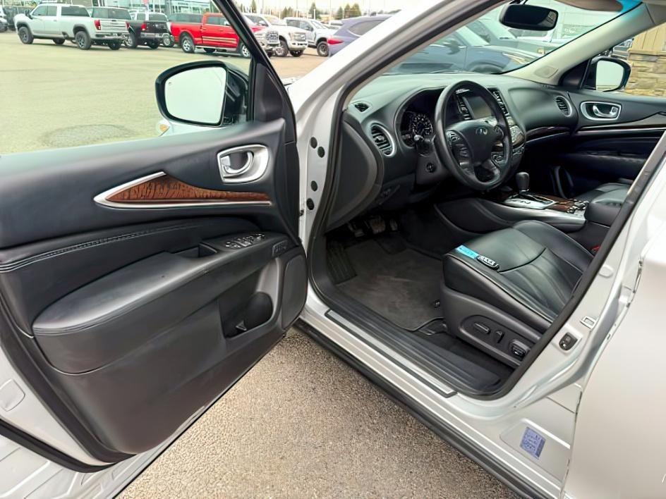 2013 SILVER /CLOTH Infiniti JX35 (5N1AL0MM9DC) with an 35L V6 engine, Automatic transmission, located at 1175 N Woodruff Ave, Idaho Falls, ID, 83401, 43.506901, -111.999657 - 2013 Infiniti JX35 powered by a 3.5L V6 engine paired with a CVT automatic transmission. Premium 7-passenger luxury SUV offering strong everyday performance and smooth highway driving. Features include leather-appointed seating, three-row configuration, tri-zone climate control, Bluetooth connectivi - Photo#14