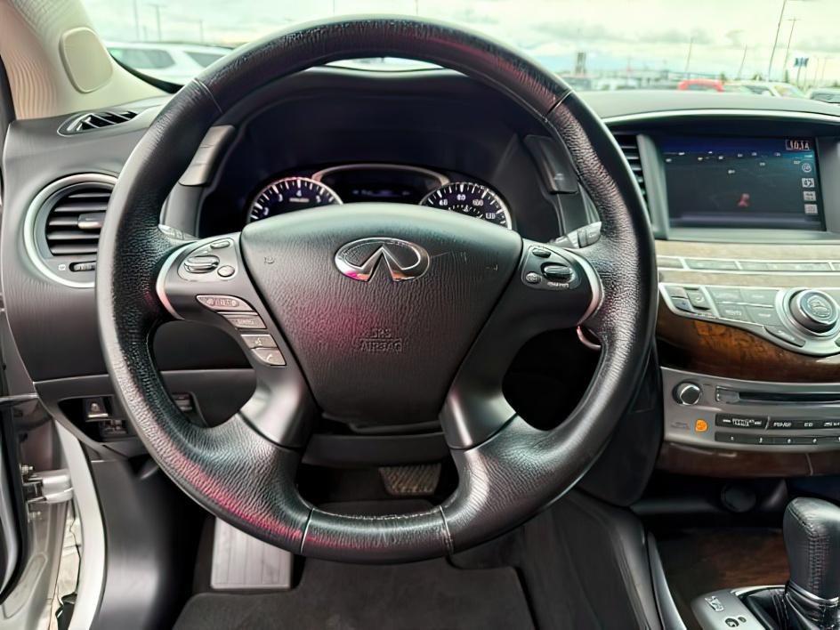 2013 SILVER /CLOTH Infiniti JX35 (5N1AL0MM9DC) with an 35L V6 engine, Automatic transmission, located at 1175 N Woodruff Ave, Idaho Falls, ID, 83401, 43.506901, -111.999657 - 2013 Infiniti JX35 powered by a 3.5L V6 engine paired with a CVT automatic transmission. Premium 7-passenger luxury SUV offering strong everyday performance and smooth highway driving. Features include leather-appointed seating, three-row configuration, tri-zone climate control, Bluetooth connectivi - Photo#17