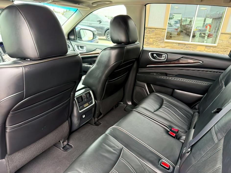 2013 SILVER /CLOTH Infiniti JX35 (5N1AL0MM9DC) with an 35L V6 engine, Automatic transmission, located at 1175 N Woodruff Ave, Idaho Falls, ID, 83401, 43.506901, -111.999657 - 2013 Infiniti JX35 powered by a 3.5L V6 engine paired with a CVT automatic transmission. Premium 7-passenger luxury SUV offering strong everyday performance and smooth highway driving. Features include leather-appointed seating, three-row configuration, tri-zone climate control, Bluetooth connectivi - Photo#26