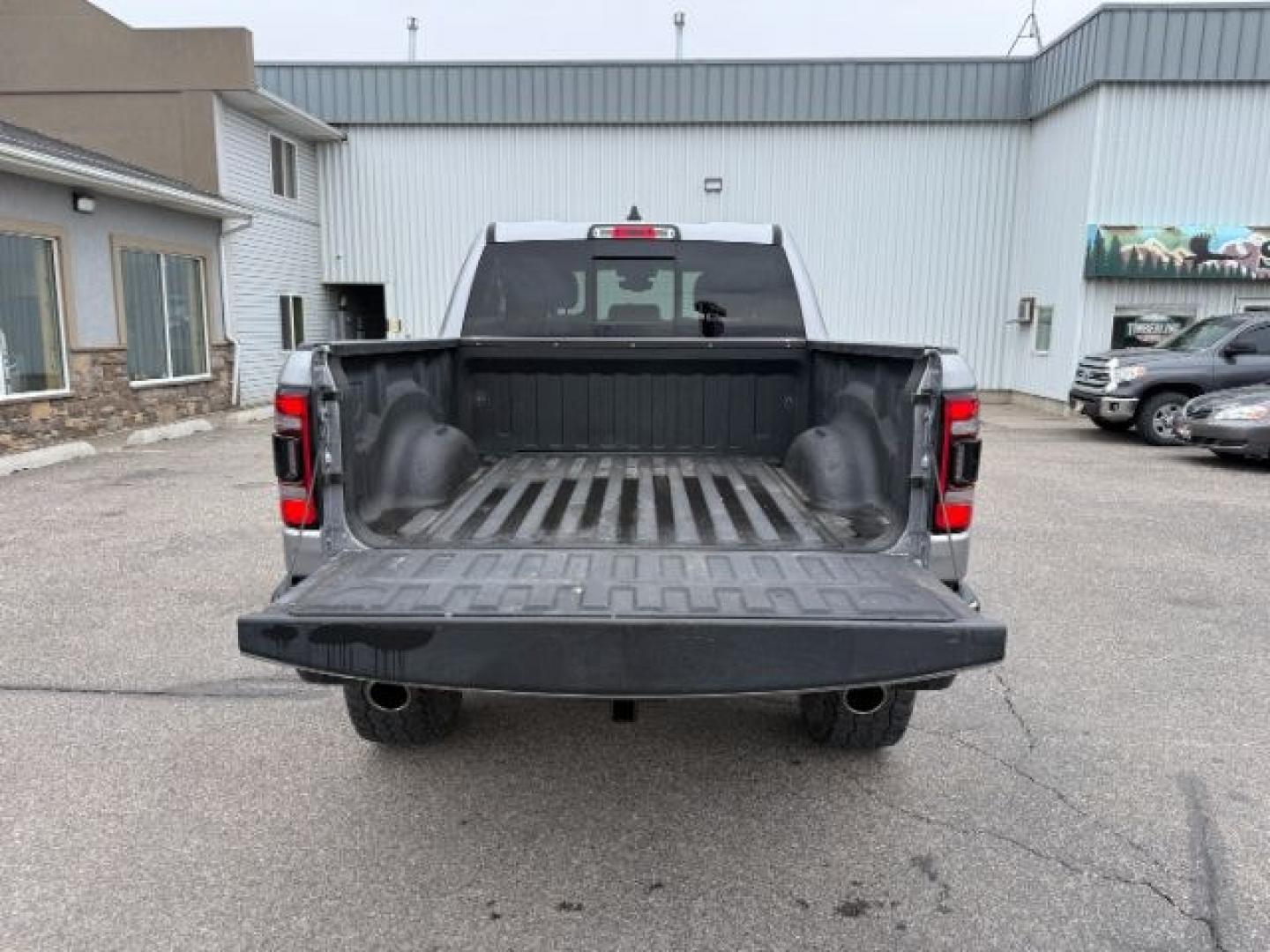 2021 SILVER /Black Ram 1500 Lone Star Crew Cab 4x4 5'7 Box (1C6SRFFT6MN) with an HEMI 5.7L V-8 variable valve control engine, AUTOMATIC transmission, located at 1235 N Woodruff Ave., Idaho Falls, 83401, (208) 523-1053, 43.507172, -112.000488 - At Timberline Auto, finding a great deal on your next vehicle is always easy! Our experienced sales staff goal is to help find you the right vehicle at the right price! Our knowledgeable finance department has options for almost any credit score. We offer extended service contract options to prot - Photo#35