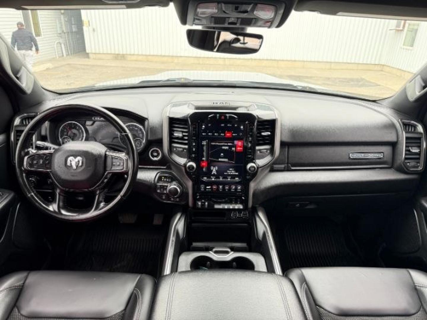 2021 SILVER /Black Ram 1500 Lone Star Crew Cab 4x4 5'7 Box (1C6SRFFT6MN) with an HEMI 5.7L V-8 variable valve control engine, AUTOMATIC transmission, located at 1235 N Woodruff Ave., Idaho Falls, 83401, (208) 523-1053, 43.507172, -112.000488 - At Timberline Auto, finding a great deal on your next vehicle is always easy! Our experienced sales staff goal is to help find you the right vehicle at the right price! Our knowledgeable finance department has options for almost any credit score. We offer extended service contract options to prot - Photo#54