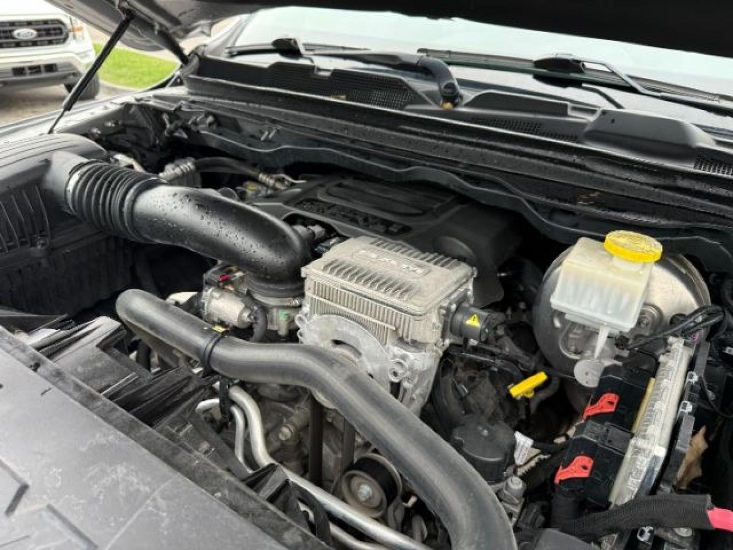 2021 SILVER /Black Ram 1500 Lone Star Crew Cab 4x4 5'7 Box (1C6SRFFT6MN) with an HEMI 5.7L V-8 variable valve control engine, AUTOMATIC transmission, located at 1235 N Woodruff Ave., Idaho Falls, 83401, (208) 523-1053, 43.507172, -112.000488 - At Timberline Auto, finding a great deal on your next vehicle is always easy! Our experienced sales staff goal is to help find you the right vehicle at the right price! Our knowledgeable finance department has options for almost any credit score. We offer extended service contract options to prot - Photo#59