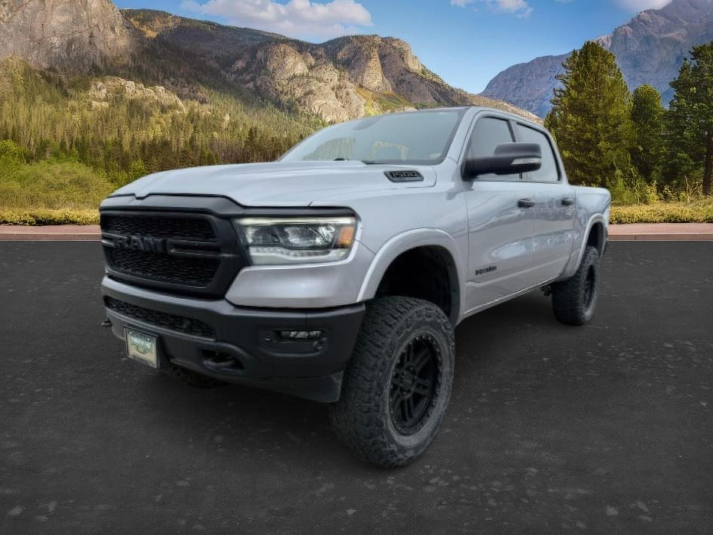 2021 SILVER /Black Ram 1500 Lone Star Crew Cab 4x4 5'7 Box (1C6SRFFT6MN) with an HEMI 5.7L V-8 variable valve control engine, AUTOMATIC transmission, located at 1235 N Woodruff Ave., Idaho Falls, 83401, (208) 523-1053, 43.507172, -112.000488 - At Timberline Auto, finding a great deal on your next vehicle is always easy! Our experienced sales staff goal is to help find you the right vehicle at the right price! Our knowledgeable finance department has options for almost any credit score. We offer extended service contract options to prot - Photo#0