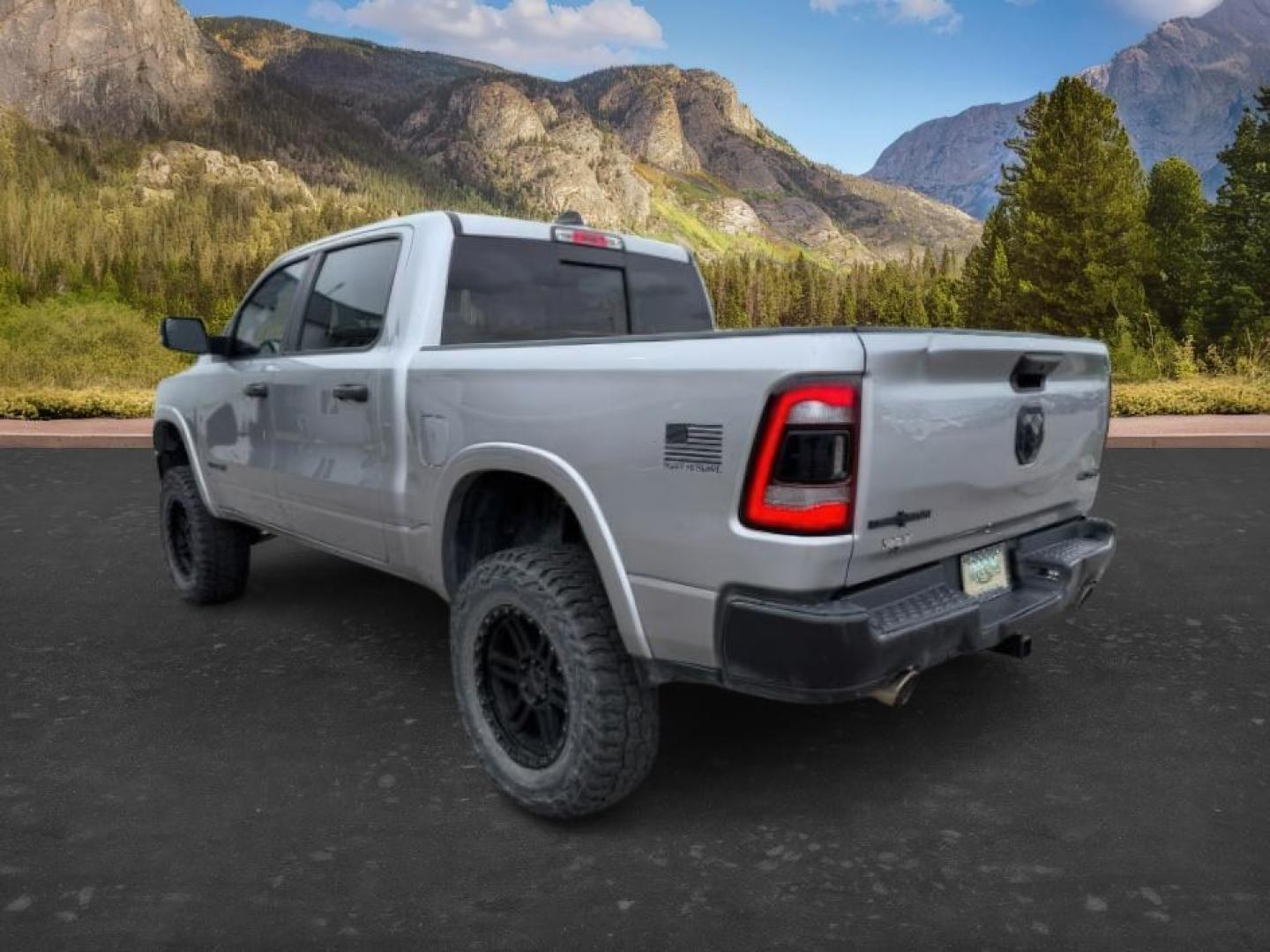 2021 SILVER /Black Ram 1500 Lone Star Crew Cab 4x4 5'7 Box (1C6SRFFT6MN) with an HEMI 5.7L V-8 variable valve control engine, AUTOMATIC transmission, located at 1235 N Woodruff Ave., Idaho Falls, 83401, (208) 523-1053, 43.507172, -112.000488 - At Timberline Auto, finding a great deal on your next vehicle is always easy! Our experienced sales staff goal is to help find you the right vehicle at the right price! Our knowledgeable finance department has options for almost any credit score. We offer extended service contract options to prot - Photo#2