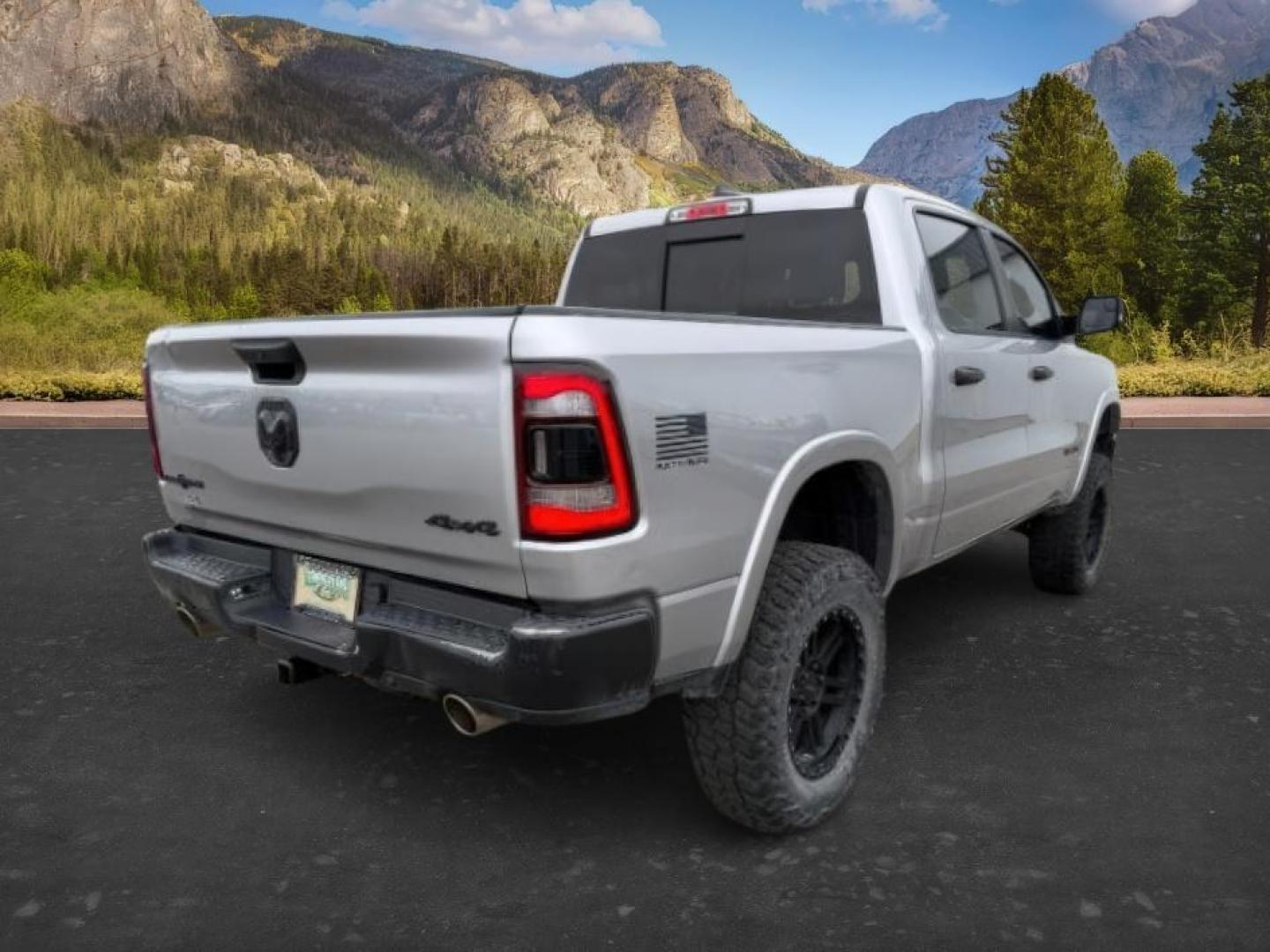 2021 SILVER /Black Ram 1500 Lone Star Crew Cab 4x4 5'7 Box (1C6SRFFT6MN) with an HEMI 5.7L V-8 variable valve control engine, AUTOMATIC transmission, located at 1235 N Woodruff Ave., Idaho Falls, 83401, (208) 523-1053, 43.507172, -112.000488 - At Timberline Auto, finding a great deal on your next vehicle is always easy! Our experienced sales staff goal is to help find you the right vehicle at the right price! Our knowledgeable finance department has options for almost any credit score. We offer extended service contract options to prot - Photo#6