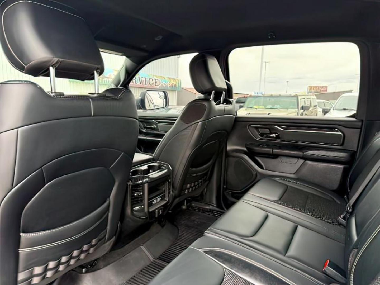 2021 SILVER /Black Ram 1500 Lone Star Crew Cab 4x4 5'7 Box (1C6SRFFT6MN) with an HEMI 5.7L V-8 variable valve control engine, AUTOMATIC transmission, located at 1235 N Woodruff Ave., Idaho Falls, 83401, (208) 523-1053, 43.507172, -112.000488 - At Timberline Auto, finding a great deal on your next vehicle is always easy! Our experienced sales staff goal is to help find you the right vehicle at the right price! Our knowledgeable finance department has options for almost any credit score. We offer extended service contract options to prot - Photo#26