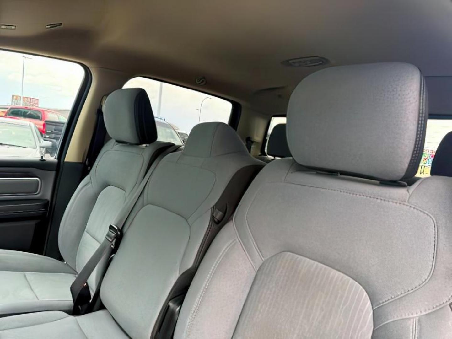 2019 GRAY /CLOTH Ram 1500 Crew Cab (1C6SRFMTXKN) with an 57L V8 engine, Automatic transmission, located at 1175 N Woodruff Ave, Idaho Falls, ID, 83401, 43.506901, -111.999657 - At Timberline Auto, finding a great deal on your next vehicle is always easy! Our experienced sales staff goal is to help find you the right vehicle at the right price! Our knowledgeable finance department has options for almost any credit score. We offer extended service contract options to prot - Photo#23
