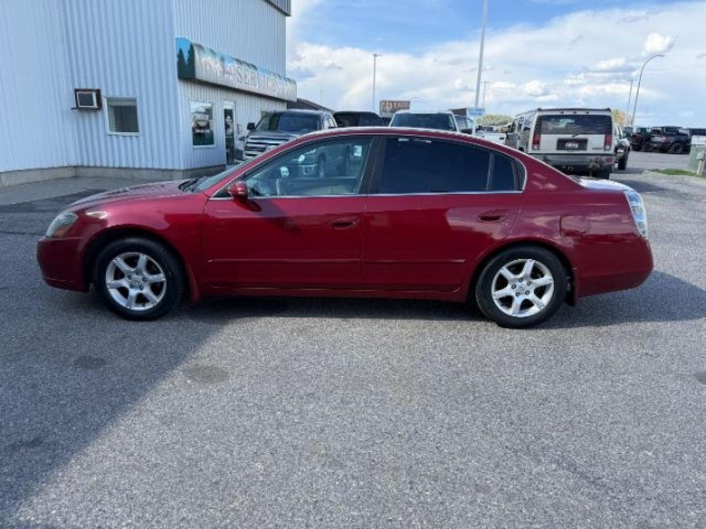 2006 RED /Charcoal Nissan Altima (1N4AL11D16N) with an 25L I-4 DOHC engine, Automatic transmission, located at 1175 N Woodruff Ave, Idaho Falls, ID, 83401, 43.506901, -111.999657 - At Timberline Auto, finding a great deal on your next vehicle is always easy! Our experienced sales staff goal is to help find you the right vehicle at the right price! Our knowledgeable finance department has options for almost any credit score. We offer extended service contract options to prot - Photo#23