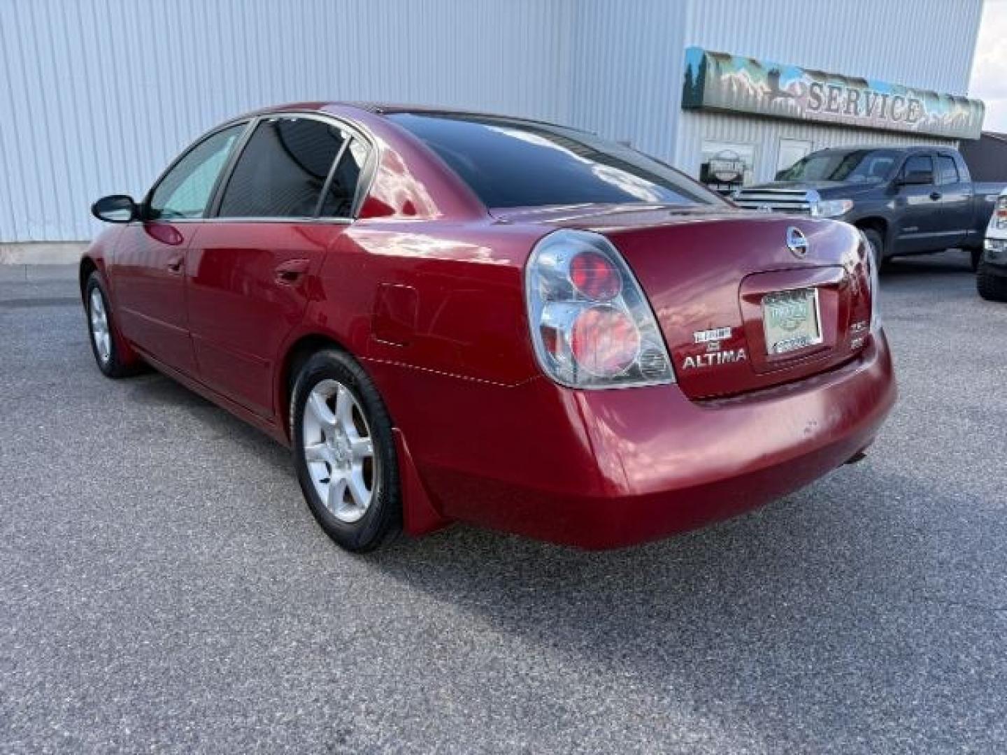 2006 RED /Charcoal Nissan Altima (1N4AL11D16N) with an 25L I-4 DOHC engine, Automatic transmission, located at 1175 N Woodruff Ave, Idaho Falls, ID, 83401, 43.506901, -111.999657 - At Timberline Auto, finding a great deal on your next vehicle is always easy! Our experienced sales staff goal is to help find you the right vehicle at the right price! Our knowledgeable finance department has options for almost any credit score. We offer extended service contract options to prot - Photo#24