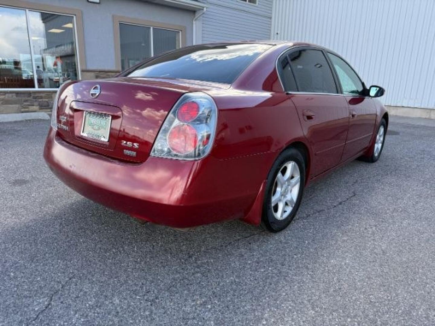 2006 RED /Charcoal Nissan Altima (1N4AL11D16N) with an 25L I-4 DOHC engine, Automatic transmission, located at 1175 N Woodruff Ave, Idaho Falls, ID, 83401, 43.506901, -111.999657 - At Timberline Auto, finding a great deal on your next vehicle is always easy! Our experienced sales staff goal is to help find you the right vehicle at the right price! Our knowledgeable finance department has options for almost any credit score. We offer extended service contract options to prot - Photo#26