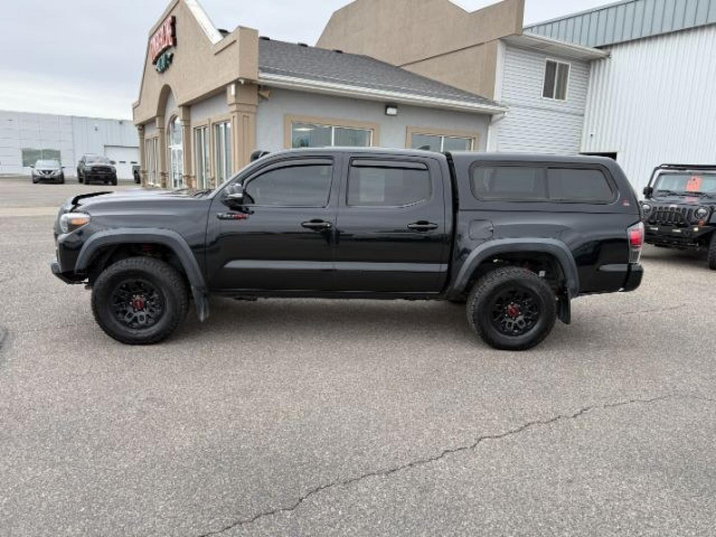 2018 BLACK /LEATHER Toyota Tacoma (5TFCZ5AN8JX) with an 35L V-6 portdirect injection engine, Automatic transmission, located at 1175 N Woodruff Ave, Idaho Falls, ID, 83401, 43.506901, -111.999657 - At Timberline Auto, finding a great deal on your next vehicle is always easy! Our experienced sales staff goal is to help find you the right vehicle at the right price! Our knowledgeable finance department has options for almost any credit score. We offer extended service contract options to prot - Photo#26