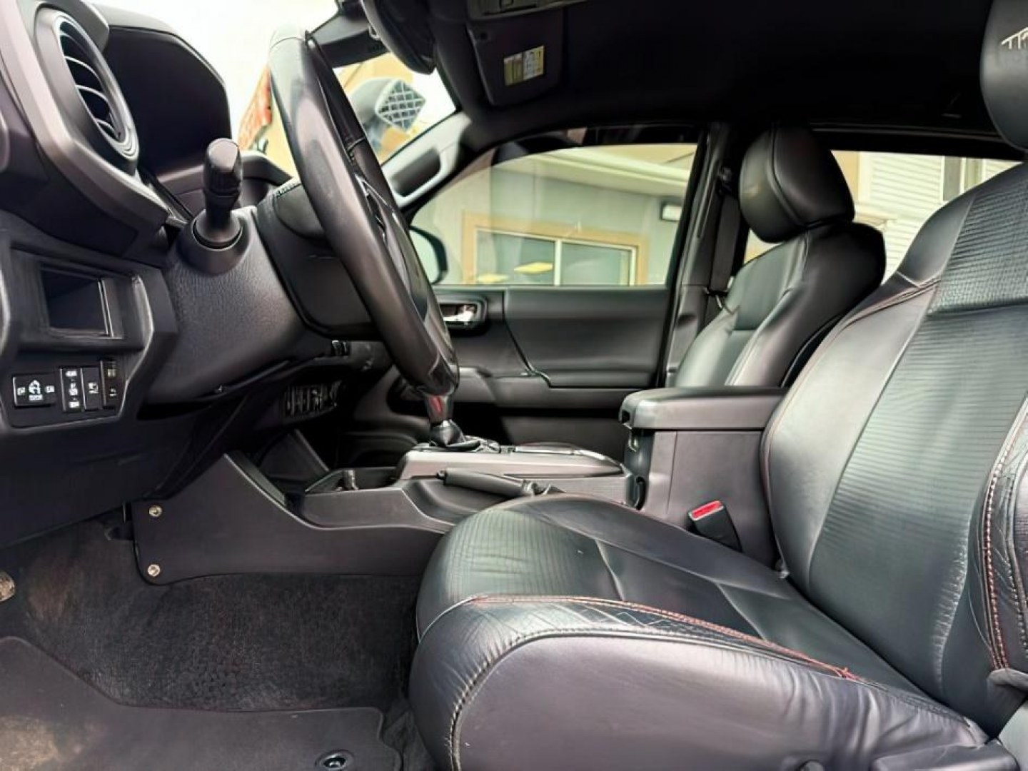 2018 BLACK /LEATHER Toyota Tacoma (5TFCZ5AN8JX) with an 35L V-6 portdirect injection engine, Automatic transmission, located at 1175 N Woodruff Ave, Idaho Falls, ID, 83401, 43.506901, -111.999657 - At Timberline Auto, finding a great deal on your next vehicle is always easy! Our experienced sales staff goal is to help find you the right vehicle at the right price! Our knowledgeable finance department has options for almost any credit score. We offer extended service contract options to prot - Photo#12