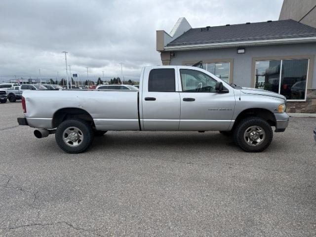 2004 SILVER /Dark Slate Gray Dodge Ram 2500 (3D7KU28C54G) with an Cummins 59L I-6 diesel direct injection engine, Automatic transmission, located at 1175 N Woodruff Ave, Idaho Falls, ID, 83401, 43.506901, -111.999657 - This 2004 Dodge Ram 2500 is a heavy-duty pickup built for durability, capability, and real-world performance. Known for its strong chassis and work-ready reputation, it delivers the confidence needed for towing, hauling, and demanding job site use. This truck is equipped with practical upgrades that- Photo#27
