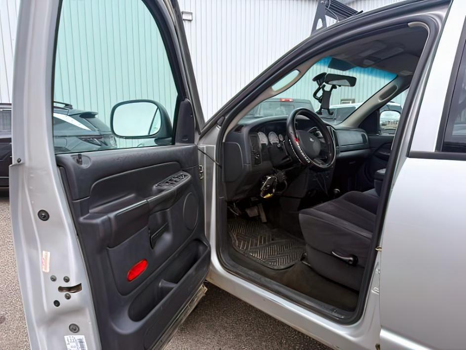 2004 SILVER /Dark Slate Gray Dodge Ram 2500 (3D7KU28C54G) with an Cummins 59L I-6 diesel direct injection engine, Automatic transmission, located at 1175 N Woodruff Ave, Idaho Falls, ID, 83401, 43.506901, -111.999657 - This 2004 Dodge Ram 2500 is a heavy-duty pickup built for durability, capability, and real-world performance. Known for its strong chassis and work-ready reputation, it delivers the confidence needed for towing, hauling, and demanding job site use. This truck is equipped with practical upgrades that- Photo#9