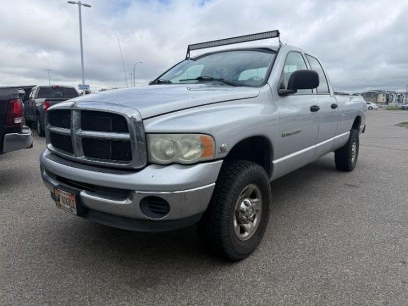 2004 Bright Silver Metallic Clearcoat /Dark Slate Gray Dodge Ram Pickup SLT (3D7KU28C54G) with an 6 Cyl, 5.9L engine, 4-speed automatic transmission, located at 1175 N Woodruff Ave, Idaho Falls, ID, 83401, 43.506901, -111.999657 - <b>Vehicle Details</b><br>Powerful, capable, and ready for work or weekend adventure, this 2004 Dodge Ram Pickup 2500 SLT/Laramie 4WD is a heavy-duty diesel truck built to handle demanding jobs with confidence. Equipped with the legendary 6-cylinder, 5.9L Diesel engine, it delivers the torque and du- Photo#0