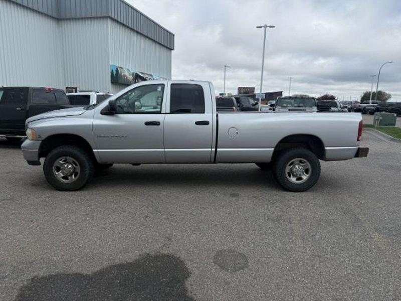 2004 Bright Silver Metallic Clearcoat /Dark Slate Gray Dodge Ram Pickup SLT (3D7KU28C54G) with an 6 Cyl, 5.9L engine, 4-speed automatic transmission, located at 1175 N Woodruff Ave, Idaho Falls, ID, 83401, 43.506901, -111.999657 - <b>Vehicle Details</b><br>Powerful, capable, and ready for work or weekend adventure, this 2004 Dodge Ram Pickup 2500 SLT/Laramie 4WD is a heavy-duty diesel truck built to handle demanding jobs with confidence. Equipped with the legendary 6-cylinder, 5.9L Diesel engine, it delivers the torque and du- Photo#1