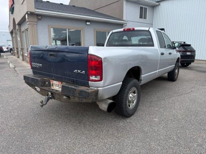 2004 Bright Silver Metallic Clearcoat /Dark Slate Gray Dodge Ram Pickup SLT (3D7KU28C54G) with an 6 Cyl, 5.9L engine, 4-speed automatic transmission, located at 1175 N Woodruff Ave, Idaho Falls, ID, 83401, 43.506901, -111.999657 - <b>Vehicle Details</b><br>Powerful, capable, and ready for work or weekend adventure, this 2004 Dodge Ram Pickup 2500 SLT/Laramie 4WD is a heavy-duty diesel truck built to handle demanding jobs with confidence. Equipped with the legendary 6-cylinder, 5.9L Diesel engine, it delivers the torque and du- Photo#4