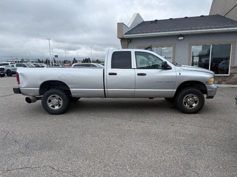2004 Bright Silver Metallic Clearcoat /Dark Slate Gray Dodge Ram Pickup SLT (3D7KU28C54G) with an 6 Cyl, 5.9L engine, 4-speed automatic transmission, located at 1175 N Woodruff Ave, Idaho Falls, ID, 83401, 43.506901, -111.999657 - <b>Vehicle Details</b><br>Powerful, capable, and ready for work or weekend adventure, this 2004 Dodge Ram Pickup 2500 SLT/Laramie 4WD is a heavy-duty diesel truck built to handle demanding jobs with confidence. Equipped with the legendary 6-cylinder, 5.9L Diesel engine, it delivers the torque and du- Photo#5