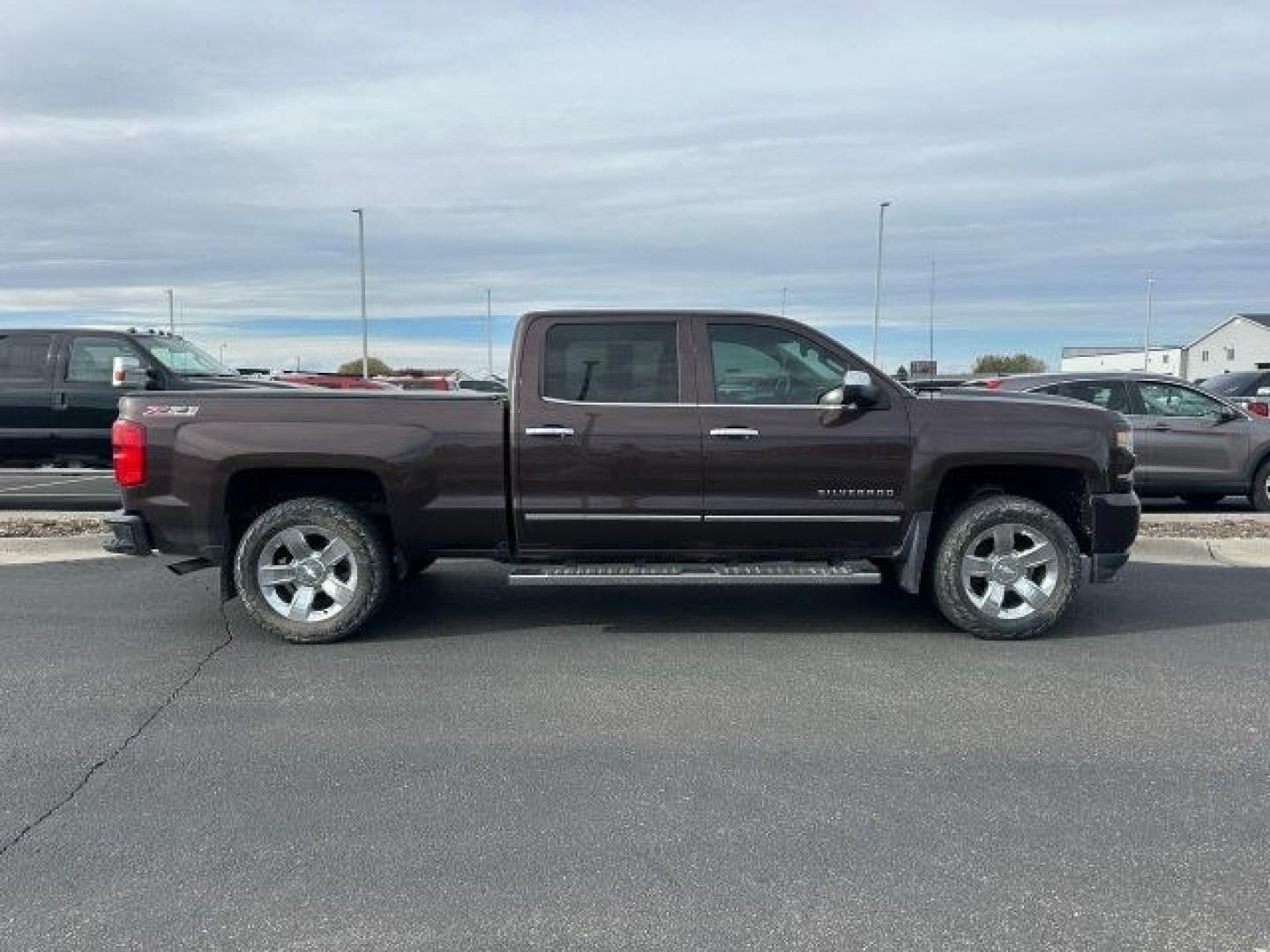 2016 Autumn Bronze Metallic /Jet Black Chevrolet Silverado 1500 (3GCUKSEC9GG) with an EcoTec3 53L V-8 gasoline direct injection engine, Automatic transmission, located at 1175 N Woodruff Ave, Idaho Falls, ID, 83401, 43.506901, -111.999657 - Photo#1