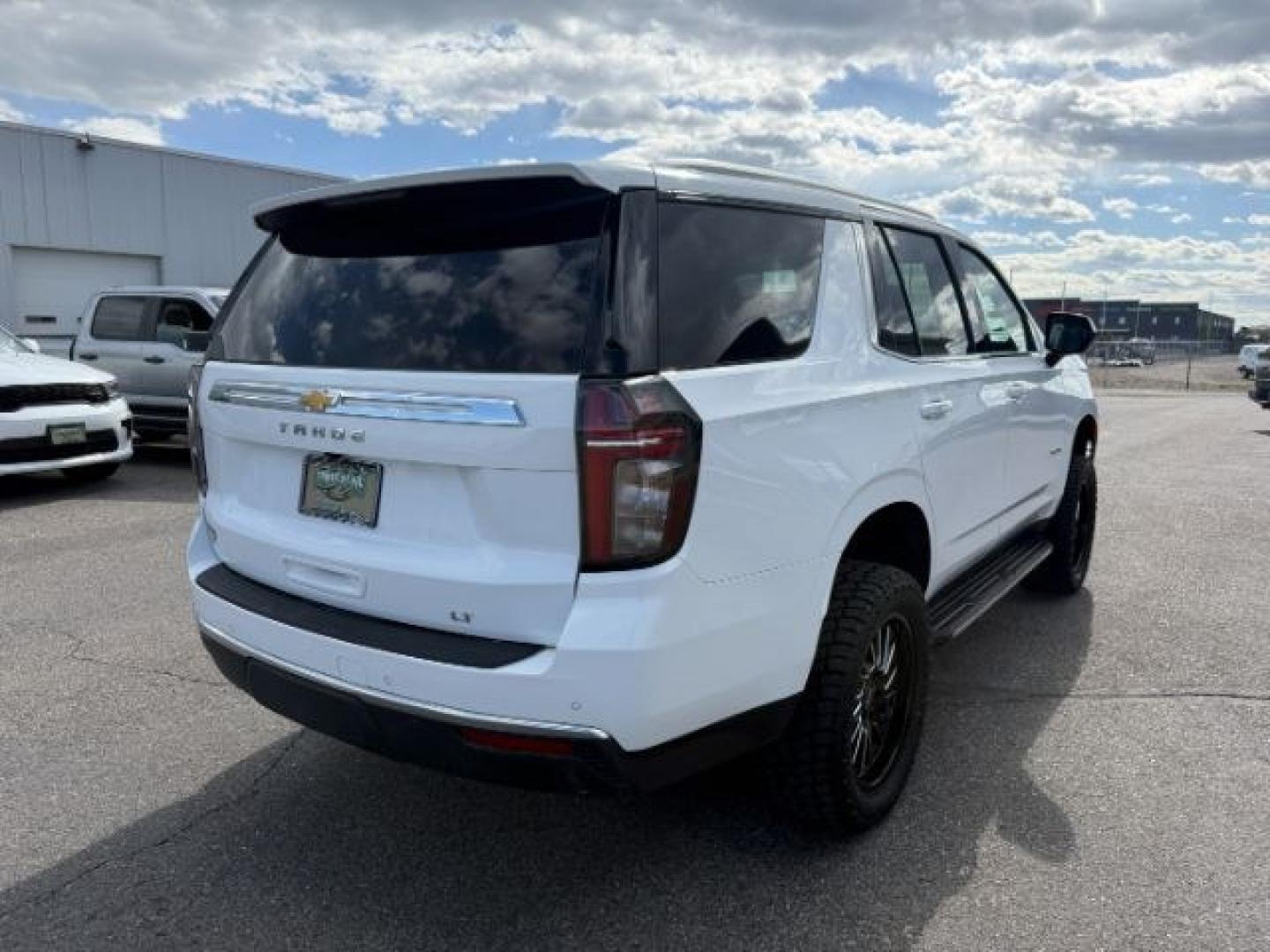 2023 WHITE /Jet Black Chevrolet Tahoe (1GNSKNKD5PR) with an EcoTec3 53L V-8 gasoline direct injection engine, Automatic transmission, located at 1175 N Woodruff Ave, Idaho Falls, ID, 83401, 43.506901, -111.999657 - At Timberline Auto, finding a great deal on your next vehicle is always easy! Our experienced sales staff goal is to help find you the right vehicle at the right price! Our knowledgeable finance department has options for almost any credit score. We offer extended service contract options to prot - Photo#39