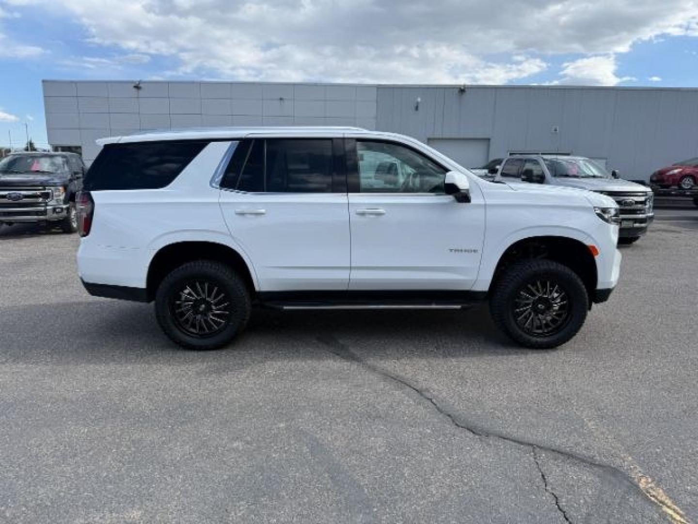 2023 WHITE /Jet Black Chevrolet Tahoe (1GNSKNKD5PR) with an EcoTec3 53L V-8 gasoline direct injection engine, Automatic transmission, located at 1175 N Woodruff Ave, Idaho Falls, ID, 83401, 43.506901, -111.999657 - At Timberline Auto, finding a great deal on your next vehicle is always easy! Our experienced sales staff goal is to help find you the right vehicle at the right price! Our knowledgeable finance department has options for almost any credit score. We offer extended service contract options to prot - Photo#40