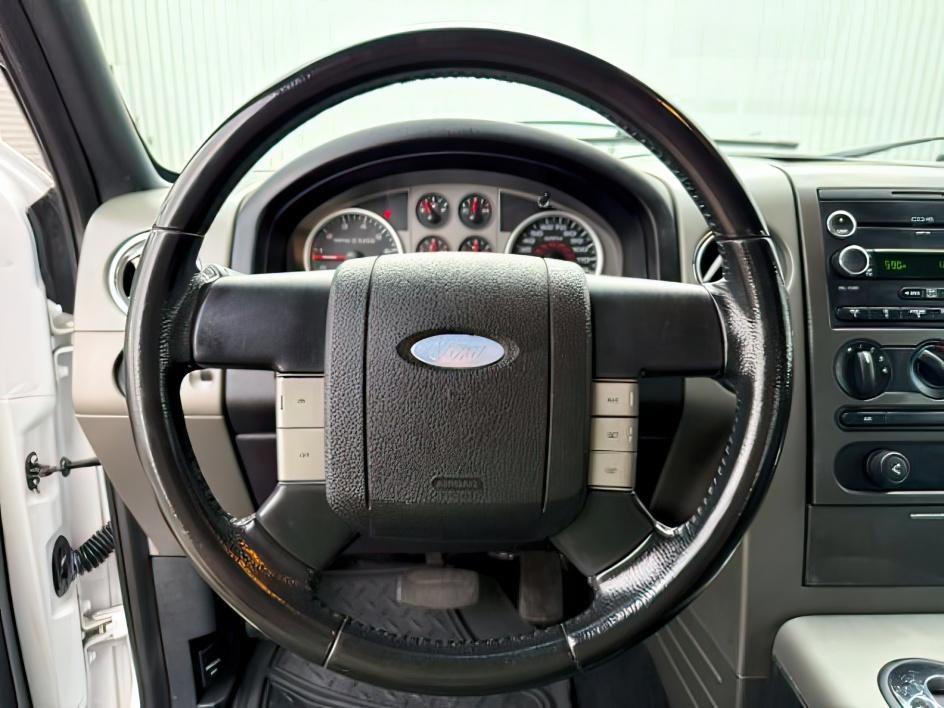 2008 WHITE /Medium Flint Ford F-150 (1FTPW14V78K) with an Triton 54L V-8 variable valve control engine, Automatic transmission, located at 1175 N Woodruff Ave, Idaho Falls, ID, 83401, 43.506901, -111.999657 - This 2008 Ford F-150 is a full-size 4x4 pickup built for dependable V8 strength and everyday utility. Powered by a 5.4L V8, it delivers solid towing capability and steady performance for hauling trailers, equipment, and work loads. The 4x4 system adds traction and control for rough roads, job sites,- Photo#12