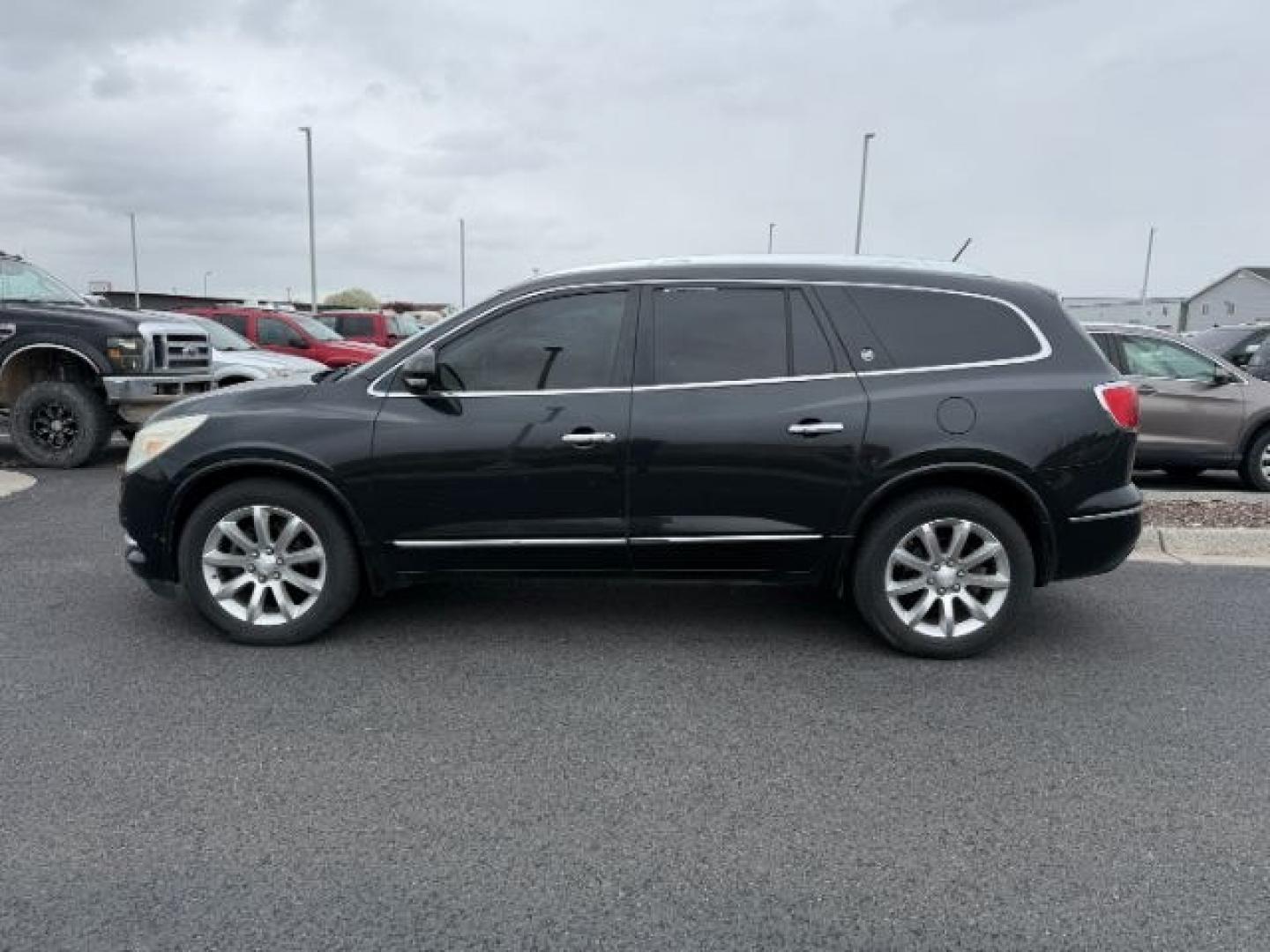 2014 BLACK /Titanium Buick Enclave Premium AWD (5GAKVCKD8EJ) with an 3.6L V6 DOHC 24V engine, 6-Speed Automatic Overdrive transmission, located at 1235 N Woodruff Ave., Idaho Falls, 83401, (208) 523-1053, 43.507172, -112.000488 - At Timberline Auto, finding a great deal on your next vehicle is always easy! Our experienced sales staff goal is to help find you the right vehicle at the right price! Our knowledgeable finance department has options for almost any credit score. We offer extended service contract options to prot - Photo#1