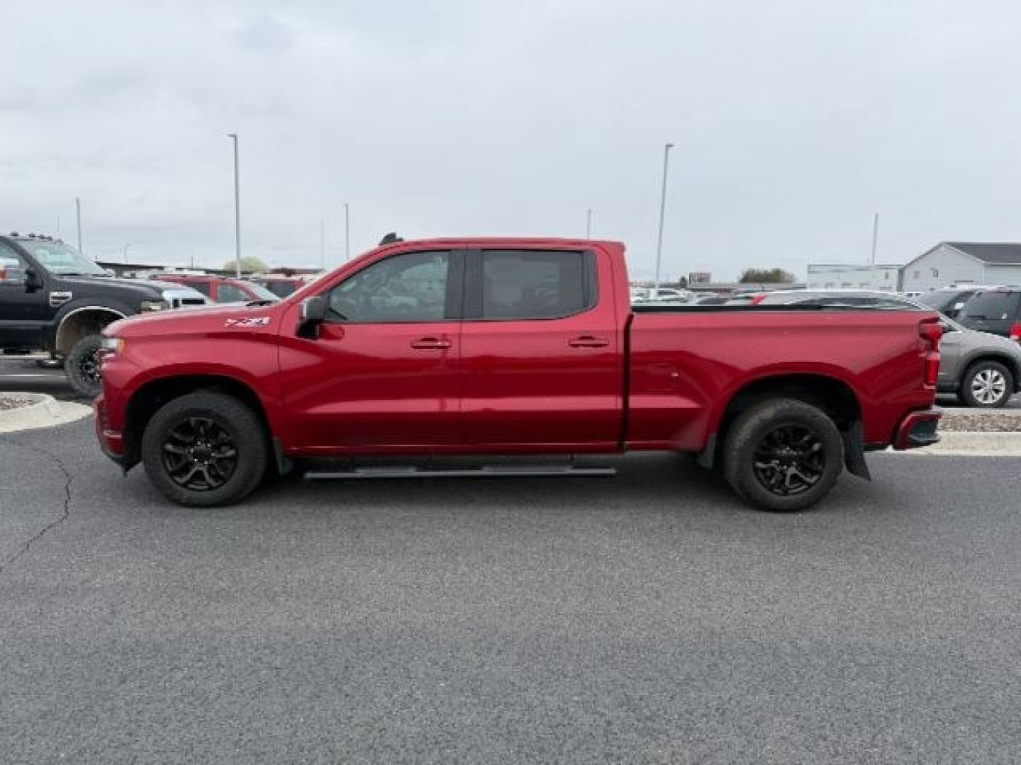 2021 RED /Jet Black Chevrolet Silverado 1500 RST (1GCUYEEDXMZ) with an EcoTec3 5.3L V-8 gasoline direct injection engine, AUTOMATIC transmission, located at 1235 N Woodruff Ave., Idaho Falls, 83401, (208) 523-1053, 43.507172, -112.000488 - At Timberline Auto, finding a great deal on your next vehicle is always easy! Our experienced sales staff goal is to help find you the right vehicle at the right price! Our knowledgeable finance department has options for almost any credit score. We offer extended service contract options to prot - Photo#1