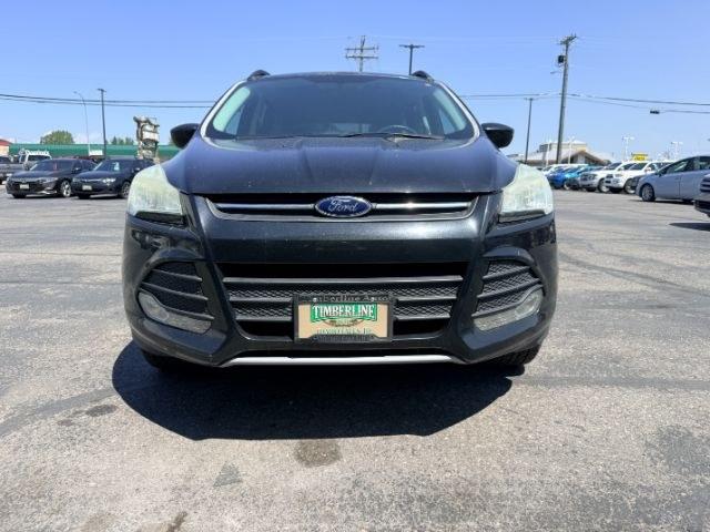 2014 BLACK /CLOTH Ford Escape (1FMCU9GX2EU) with an 16L I4 engine, Automatic transmission, located at 1175 N Woodruff Ave, Idaho Falls, ID, 83401, 43.506901, -111.999657 - Compact SUV practicality and everyday drivability come together in this 2014 Ford Escape 4WD equipped with a 1.6L EcoBoost turbocharged engine. Four wheel drive capability adds traction for changing road conditions while the compact SUV size keeps it easy to maneuver around town and in tighter parki- Photo#38