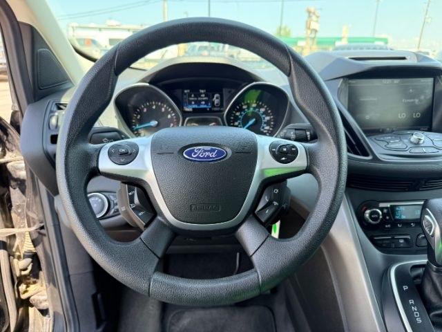 2014 BLACK /CLOTH Ford Escape (1FMCU9GX2EU) with an 16L I4 engine, Automatic transmission, located at 1175 N Woodruff Ave, Idaho Falls, ID, 83401, 43.506901, -111.999657 - Compact SUV practicality and everyday drivability come together in this 2014 Ford Escape 4WD equipped with a 1.6L EcoBoost turbocharged engine. Four wheel drive capability adds traction for changing road conditions while the compact SUV size keeps it easy to maneuver around town and in tighter parki- Photo#44