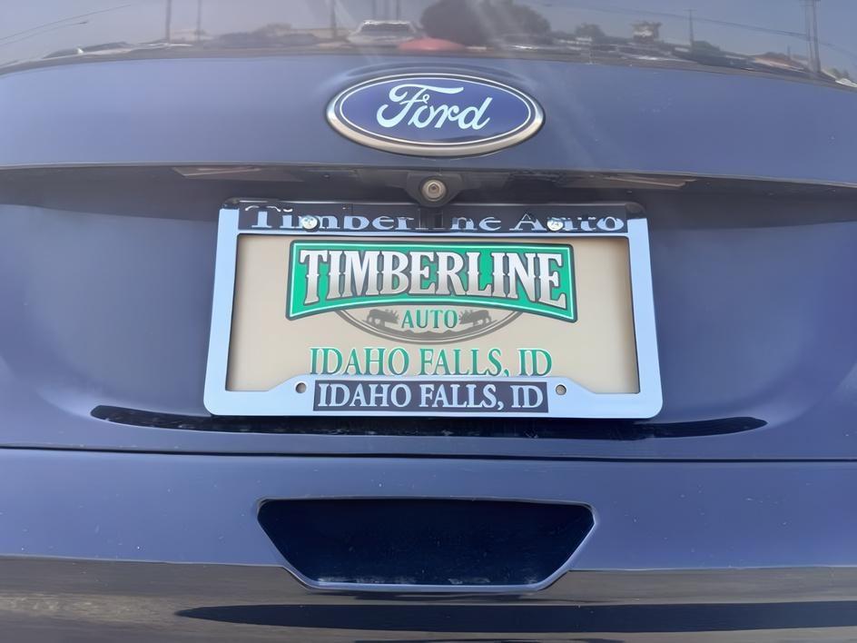 2014 BLACK /CLOTH Ford Escape (1FMCU9GX2EU) with an 16L I4 engine, Automatic transmission, located at 1175 N Woodruff Ave, Idaho Falls, ID, 83401, 43.506901, -111.999657 - Compact SUV practicality and everyday drivability come together in this 2014 Ford Escape 4WD equipped with a 1.6L EcoBoost turbocharged engine. Four wheel drive capability adds traction for changing road conditions while the compact SUV size keeps it easy to maneuver around town and in tighter parki- Photo#4