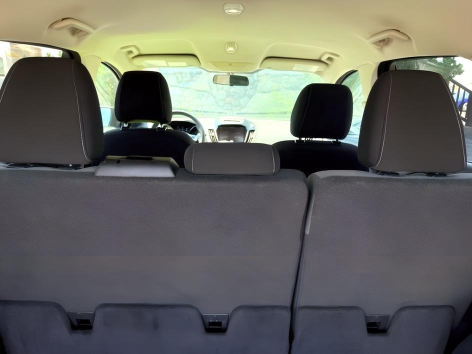 2014 BLACK /CLOTH Ford Escape (1FMCU9GX2EU) with an 16L I4 engine, Automatic transmission, located at 1175 N Woodruff Ave, Idaho Falls, ID, 83401, 43.506901, -111.999657 - Compact SUV practicality and everyday drivability come together in this 2014 Ford Escape 4WD equipped with a 1.6L EcoBoost turbocharged engine. Four wheel drive capability adds traction for changing road conditions while the compact SUV size keeps it easy to maneuver around town and in tighter parki- Photo#6