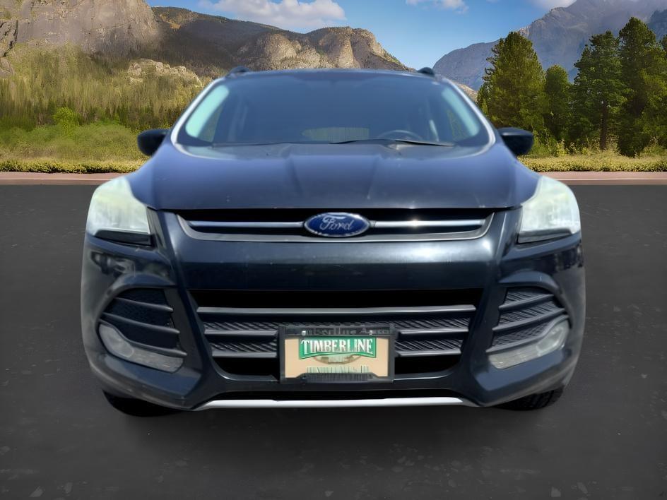 2014 BLACK /CLOTH Ford Escape (1FMCU9GX2EU) with an 16L I4 engine, Automatic transmission, located at 1175 N Woodruff Ave, Idaho Falls, ID, 83401, 43.506901, -111.999657 - Compact SUV practicality and everyday drivability come together in this 2014 Ford Escape 4WD equipped with a 1.6L EcoBoost turbocharged engine. Four wheel drive capability adds traction for changing road conditions while the compact SUV size keeps it easy to maneuver around town and in tighter parki- Photo#10