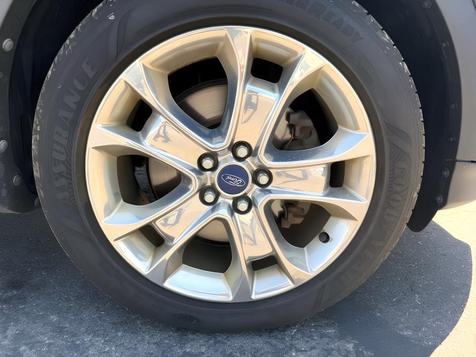 2014 BLACK /CLOTH Ford Escape (1FMCU9GX2EU) with an 16L I4 engine, Automatic transmission, located at 1175 N Woodruff Ave, Idaho Falls, ID, 83401, 43.506901, -111.999657 - Compact SUV practicality and everyday drivability come together in this 2014 Ford Escape 4WD equipped with a 1.6L EcoBoost turbocharged engine. Four wheel drive capability adds traction for changing road conditions while the compact SUV size keeps it easy to maneuver around town and in tighter parki- Photo#12