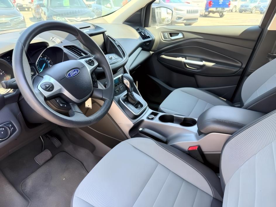 2014 BLACK /CLOTH Ford Escape (1FMCU9GX2EU) with an 16L I4 engine, Automatic transmission, located at 1175 N Woodruff Ave, Idaho Falls, ID, 83401, 43.506901, -111.999657 - Compact SUV practicality and everyday drivability come together in this 2014 Ford Escape 4WD equipped with a 1.6L EcoBoost turbocharged engine. Four wheel drive capability adds traction for changing road conditions while the compact SUV size keeps it easy to maneuver around town and in tighter parki- Photo#15