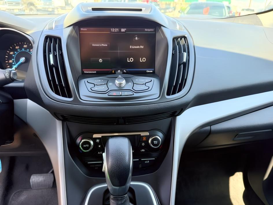 2014 BLACK /CLOTH Ford Escape (1FMCU9GX2EU) with an 16L I4 engine, Automatic transmission, located at 1175 N Woodruff Ave, Idaho Falls, ID, 83401, 43.506901, -111.999657 - Compact SUV practicality and everyday drivability come together in this 2014 Ford Escape 4WD equipped with a 1.6L EcoBoost turbocharged engine. Four wheel drive capability adds traction for changing road conditions while the compact SUV size keeps it easy to maneuver around town and in tighter parki- Photo#17