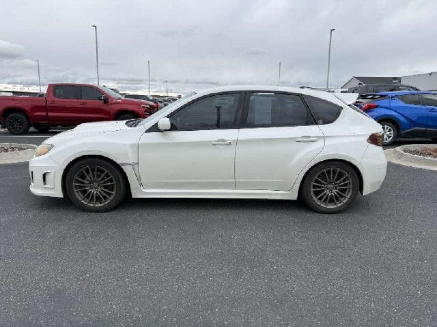 2011 WHITE /Carbon Black Subaru Impreza (JF1GR7E60BG) with an 25L H-4 DOHC engine, Manual transmission, located at 1175 N Woodruff Ave, Idaho Falls, ID, 83401, 43.506901, -111.999657 - Photo#1