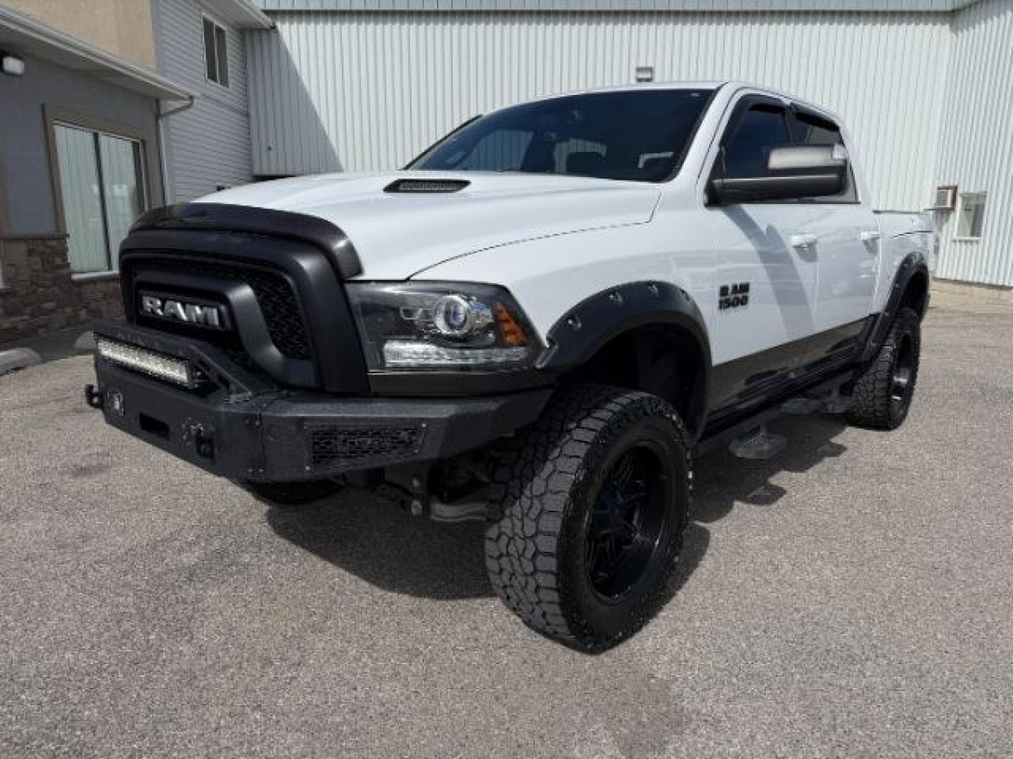 2017 Bright White Clearcoat /Red/Black Ram 1500 Rebel Crew Cab 4x4 5'7 Box (1C6RR7YT3HS) with an HEMI 5.7L V-8 variable valve control engine, AUTOMATIC transmission, located at 1235 N Woodruff Ave., Idaho Falls, 83401, (208) 523-1053, 43.507172, -112.000488 - At Timberline Auto, finding a great deal on your next vehicle is always easy! Our experienced sales staff goal is to help find you the right vehicle at the right price! Our knowledgeable finance department has options for almost any credit score. We offer extended service contract options to prot - Photo#28