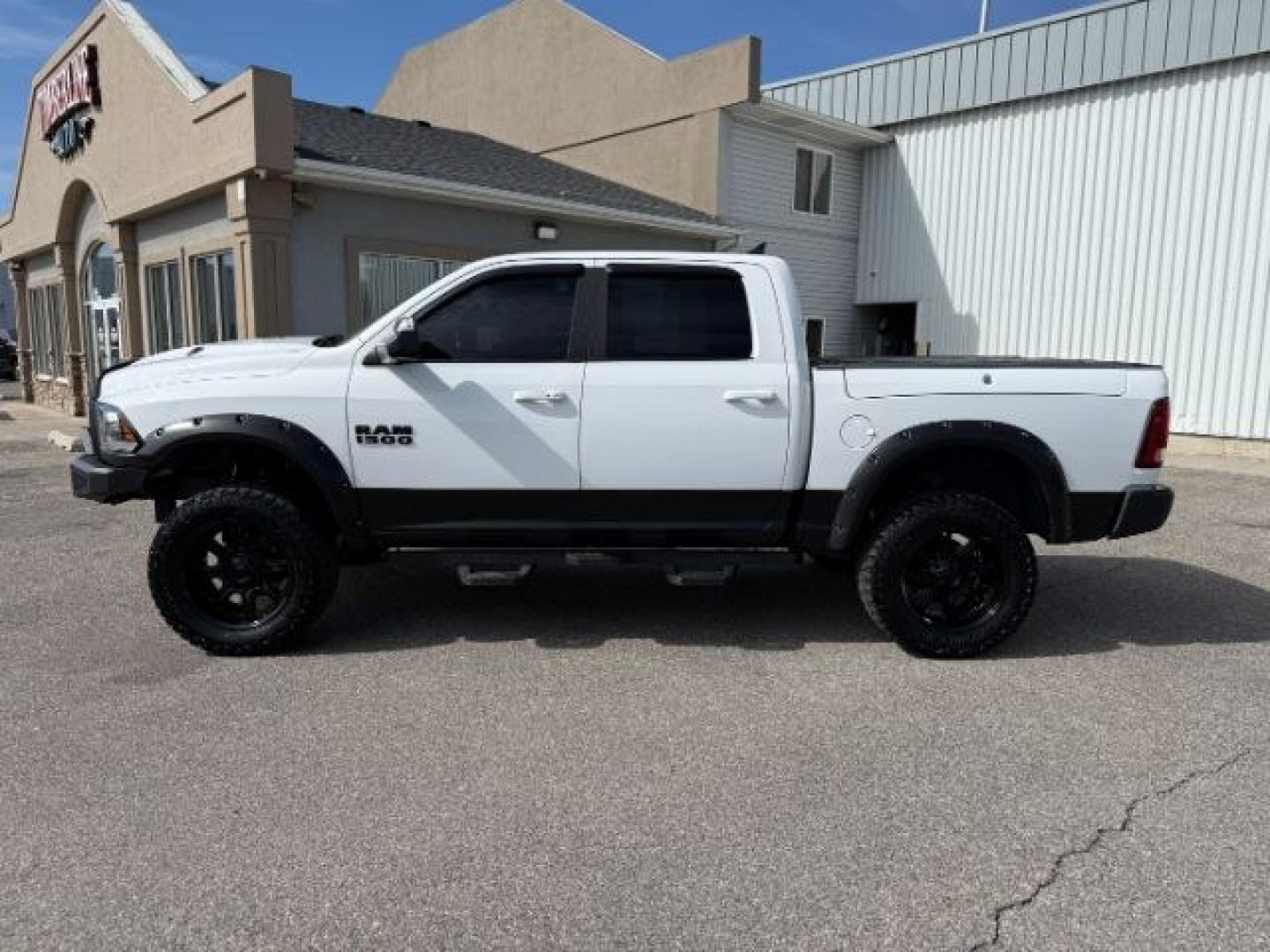2017 Bright White Clearcoat /Red/Black Ram 1500 Rebel Crew Cab 4x4 5'7 Box (1C6RR7YT3HS) with an HEMI 5.7L V-8 variable valve control engine, AUTOMATIC transmission, located at 1235 N Woodruff Ave., Idaho Falls, 83401, (208) 523-1053, 43.507172, -112.000488 - At Timberline Auto, finding a great deal on your next vehicle is always easy! Our experienced sales staff goal is to help find you the right vehicle at the right price! Our knowledgeable finance department has options for almost any credit score. We offer extended service contract options to prot - Photo#29