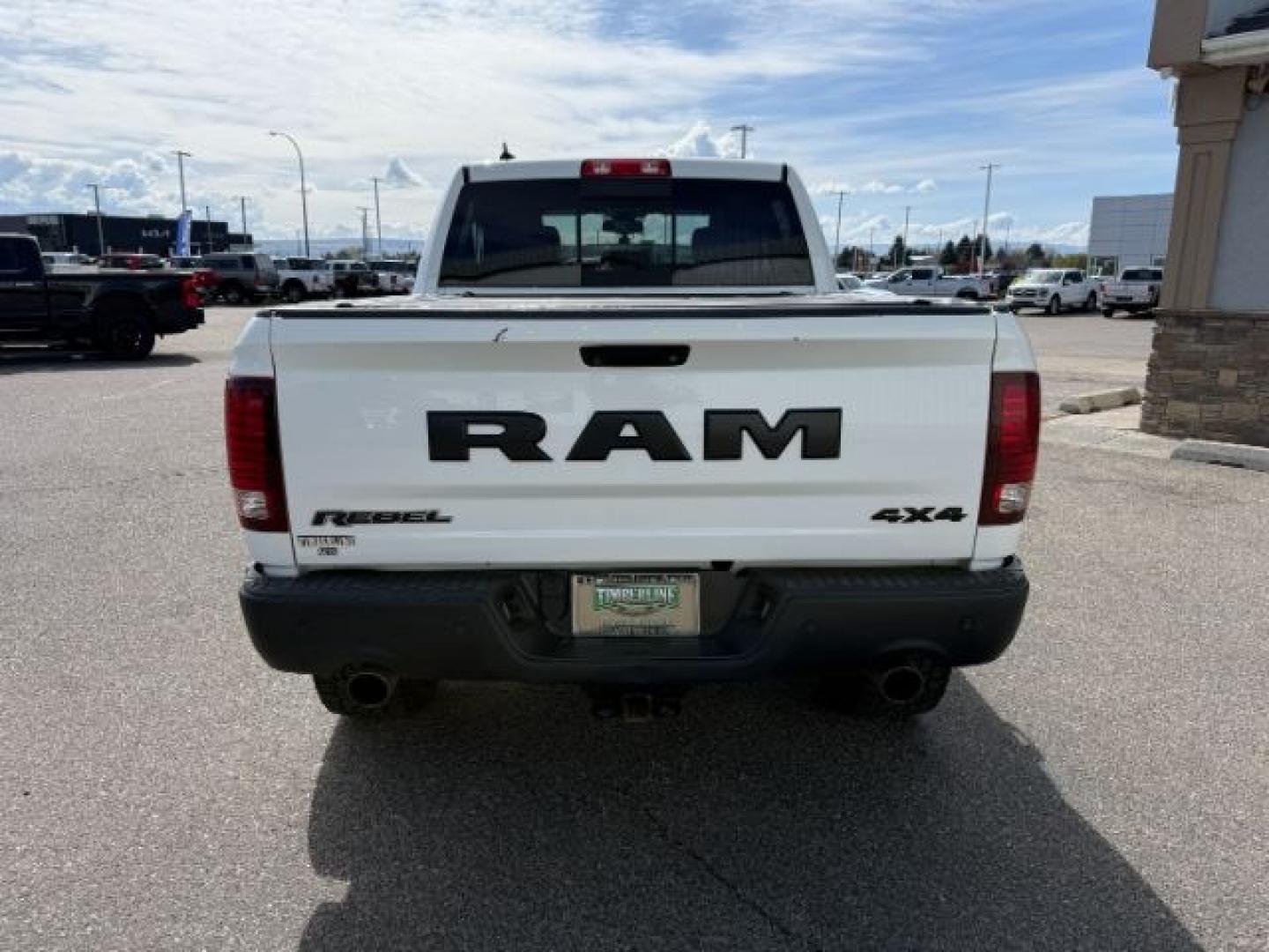 2017 Bright White Clearcoat /Red/Black Ram 1500 Rebel Crew Cab 4x4 5'7 Box (1C6RR7YT3HS) with an HEMI 5.7L V-8 variable valve control engine, AUTOMATIC transmission, located at 1235 N Woodruff Ave., Idaho Falls, 83401, (208) 523-1053, 43.507172, -112.000488 - At Timberline Auto, finding a great deal on your next vehicle is always easy! Our experienced sales staff goal is to help find you the right vehicle at the right price! Our knowledgeable finance department has options for almost any credit score. We offer extended service contract options to prot - Photo#31