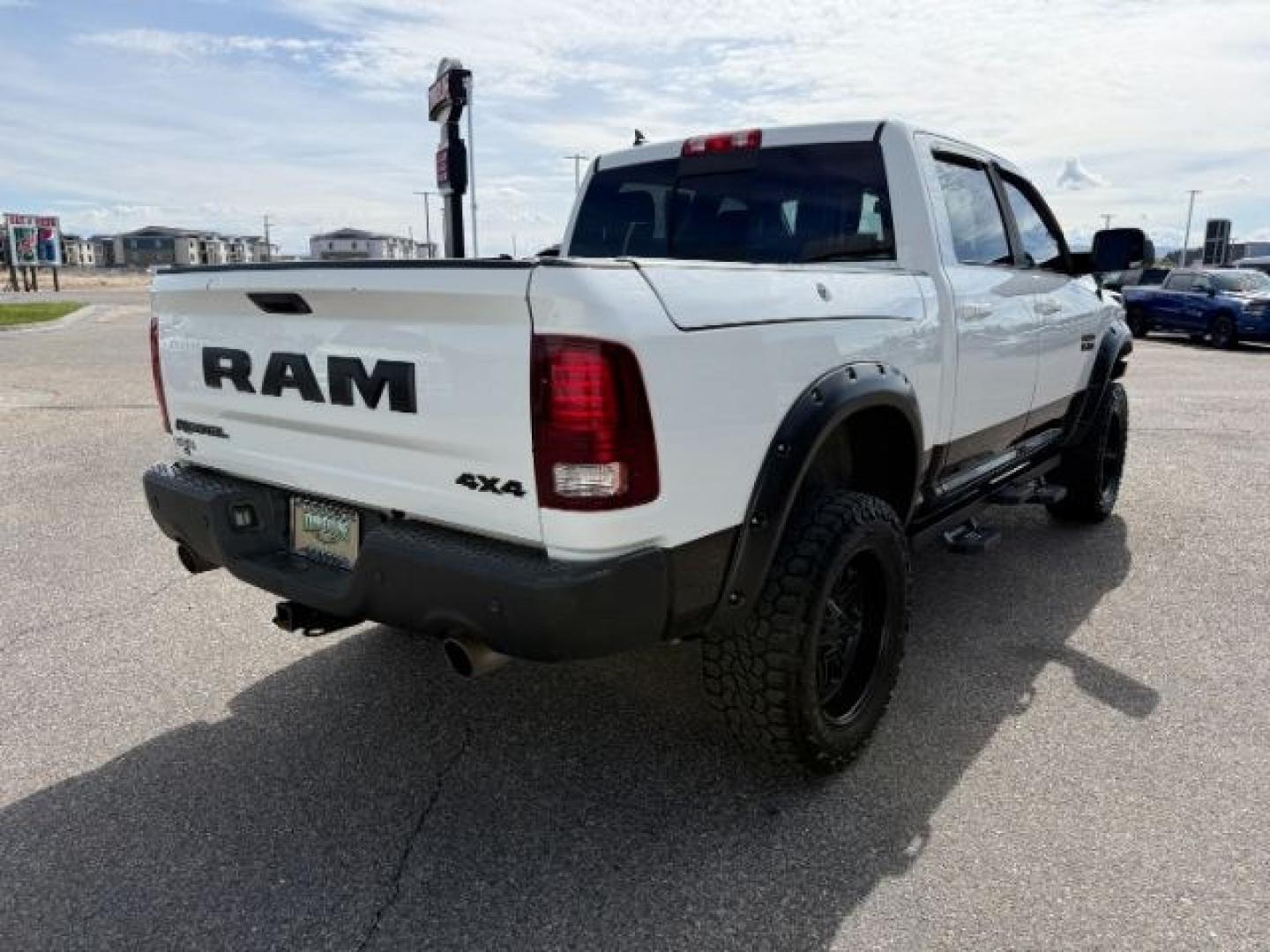 2017 Bright White Clearcoat /Red/Black Ram 1500 Rebel Crew Cab 4x4 5'7 Box (1C6RR7YT3HS) with an HEMI 5.7L V-8 variable valve control engine, AUTOMATIC transmission, located at 1235 N Woodruff Ave., Idaho Falls, 83401, (208) 523-1053, 43.507172, -112.000488 - At Timberline Auto, finding a great deal on your next vehicle is always easy! Our experienced sales staff goal is to help find you the right vehicle at the right price! Our knowledgeable finance department has options for almost any credit score. We offer extended service contract options to prot - Photo#34